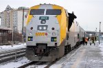 Westbound Corridor train loads passengers